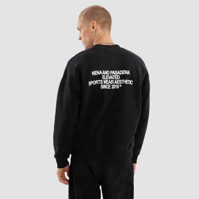 Model wears Halo Box Fit Sweater Sunbleached Anthracite Black Jumpers Black – image 4