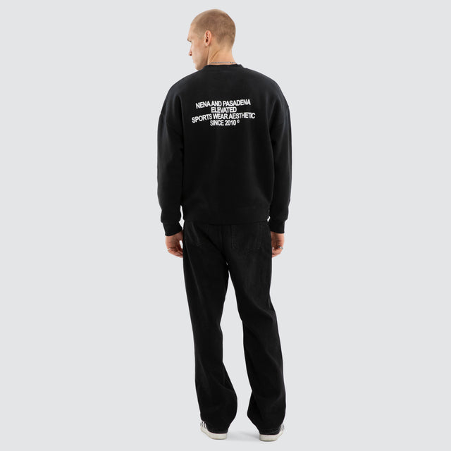 Model wears Halo Box Fit Sweater Sunbleached Anthracite Black Jumpers Black – image 2