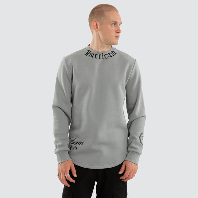 Model wears Script Dual Curved Sweater Neutral Grey Jumpers Grey – image 4