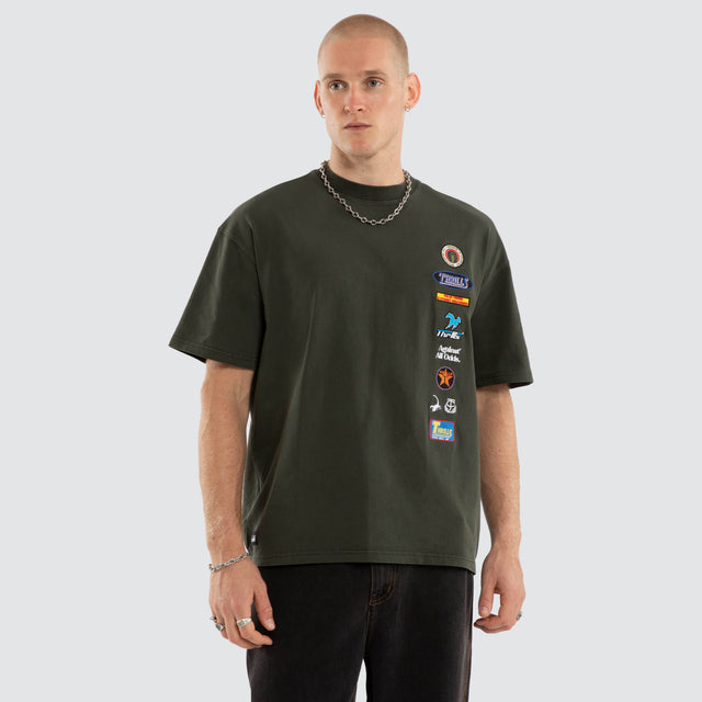 Against All Odds Box Fit Tee Oil Green