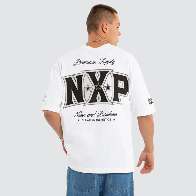 Model wears NXP Authority Oversized Tee Optical White T-Shirts in White - Image 4