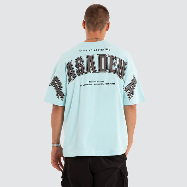Model wears NXP Factor Loopback Raptor Tee Blue T-Shirts in Blue - Image 2