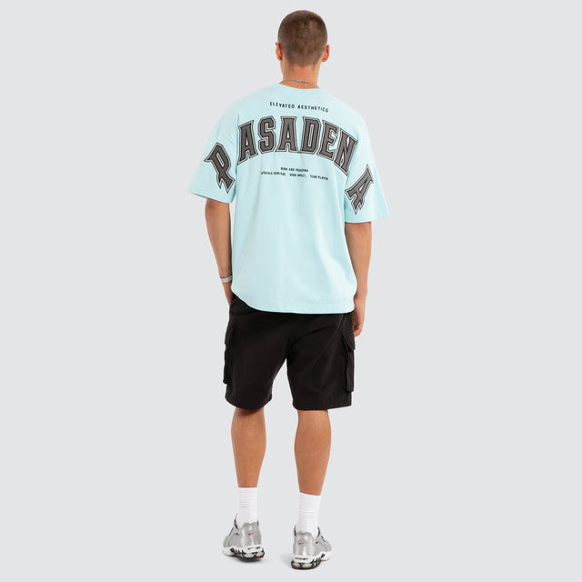 Model wears NXP Factor Loopback Raptor Tee Blue T-Shirts in Blue - Image 5
