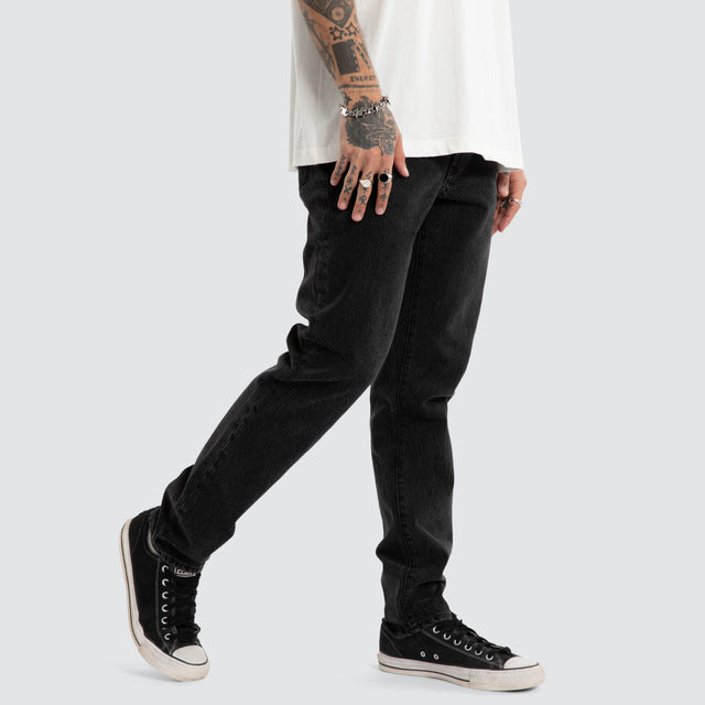 Model wears K3 Slim Jean Jet Black Pants Black – image 3
