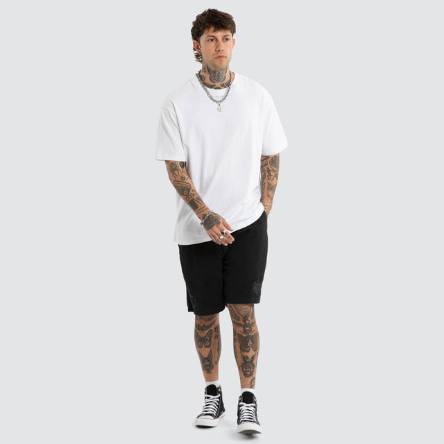 Model wears Mosh Baggy Short 2.0 Jet Black Shorts Black – image 4