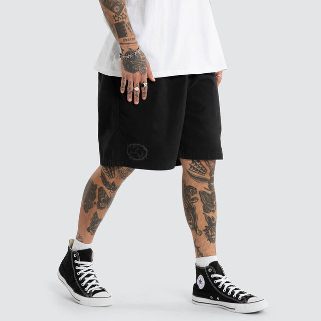 Model wears Mosh Baggy Short 2.0 Jet Black Shorts Black – image 2