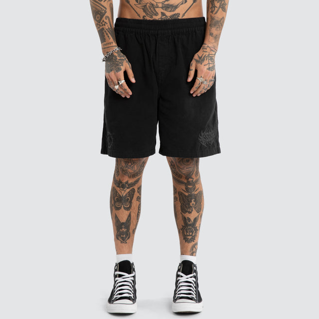 Model wears Mosh Baggy Short 2.0 Jet Black Shorts Black – image 1