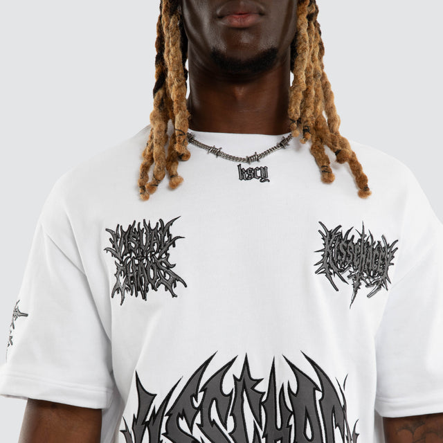 Model wears Goliath Loopback Street Tee Optical White T-Shirts White – image 4