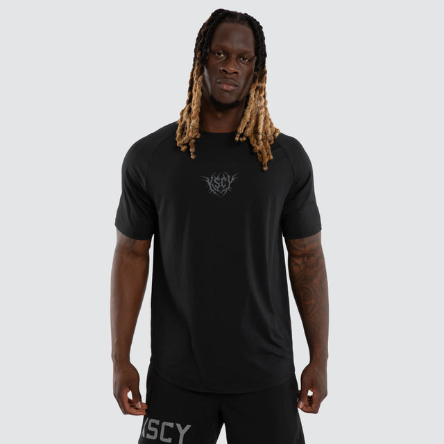 Model wears Fuel Training Raglan Tee Anthracite Black T-Shirts Black – image 1