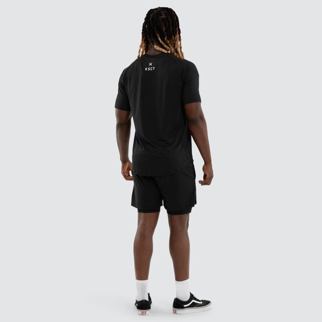 Model wears Fuel Training Raglan Tee Anthracite Black T-Shirts Black – image 2