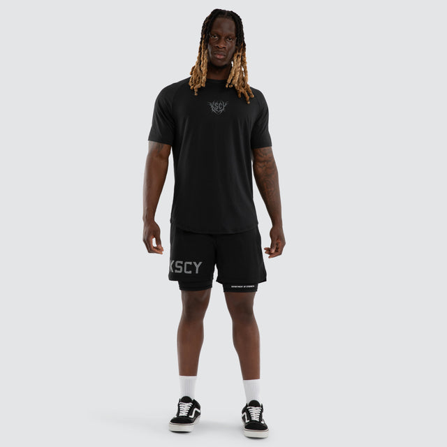 Model wears Fuel Training Raglan Tee Anthracite Black T-Shirts Black – image 5