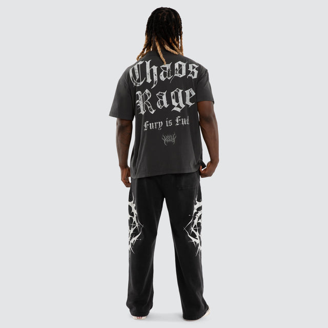 Model wears Creeper Pump Cover Raptor Tee Pigment Black T-Shirts Black – image 2