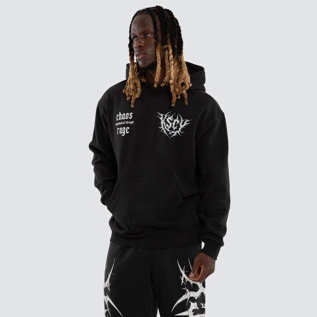 Model wears Fuel Training Relaxed Hoodie Black Hoodies Black – image 3