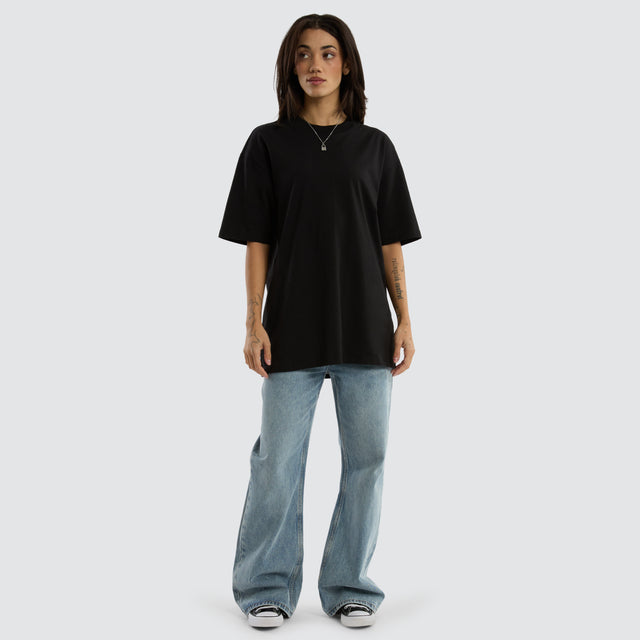 model wears Brooks Heavy Box Fit Tee Jet Black T-Shirts Black - image 6