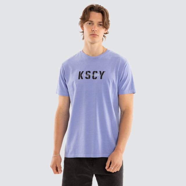 Model wears Utility Standard Tee Pigment Purple Trumpet T-Shirts Purple – image 3