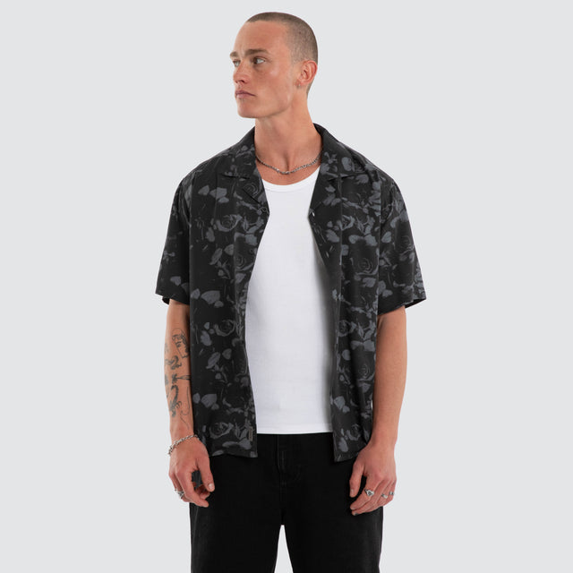 Model wears Thorn Button Up Shirt Black Print Long Sleeve Shirts Black – image 1