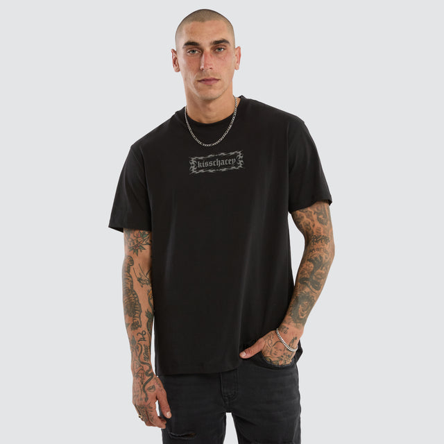 Model wears Saviour Relaxed Tee Jet Black T-Shirts Black – image 1