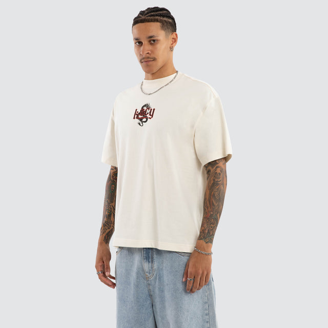 Model wears Dragon Street Tee Tofu T-Shirts Cream – image 5