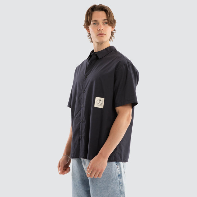 Model wears Ashfall SS Skate Shirt Asphalt Check Short Sleeve Shirts Grey – image 3