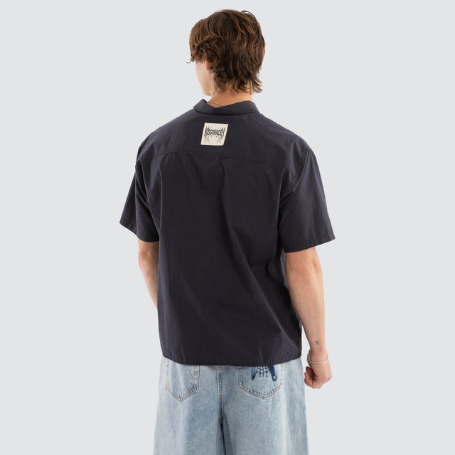 Model wears Ashfall SS Skate Shirt Asphalt Check Short Sleeve Shirts Grey – image 4