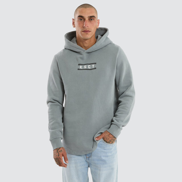 Model wears Divine Dual Curved Hoodie Pigment Ultimate Grey Hoodies Grey – image 4
