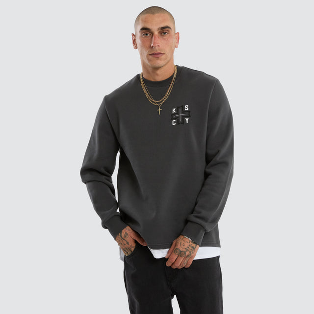 Model wears Roast Layered Sweater Asphalt Jumpers Grey – image 3