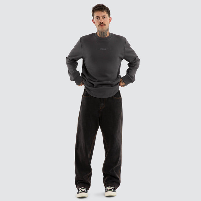 Model wears Insurgence Dual Curved Sweater Asphalt Jumpers Grey – image 5