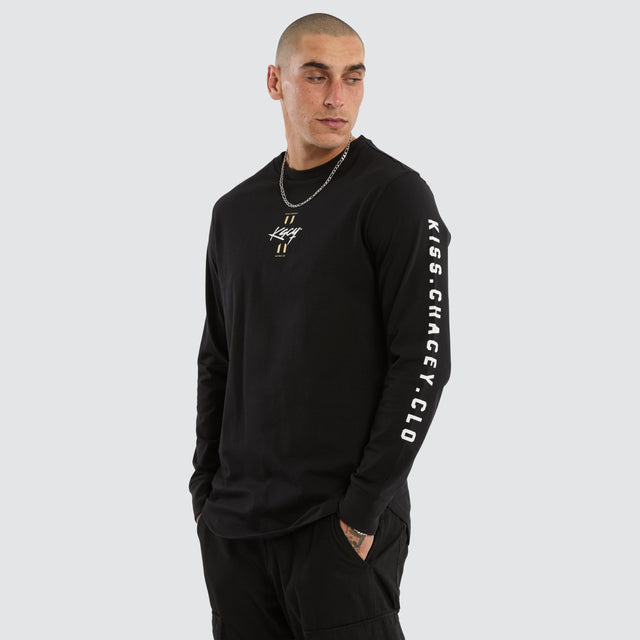 Model wears Prayers Dual Cured Long Sleeve Tee Jet Black Longsleeve T-Shirts Black – image 3