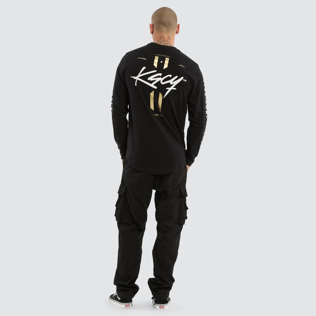 Model wears Prayers Dual Cured Long Sleeve Tee Jet Black Longsleeve T-Shirts Black – image 4