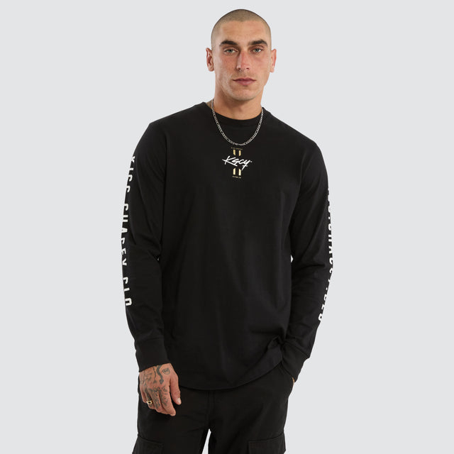 Model wears Prayers Dual Cured Long Sleeve Tee Jet Black Longsleeve T-Shirts Black – image 5