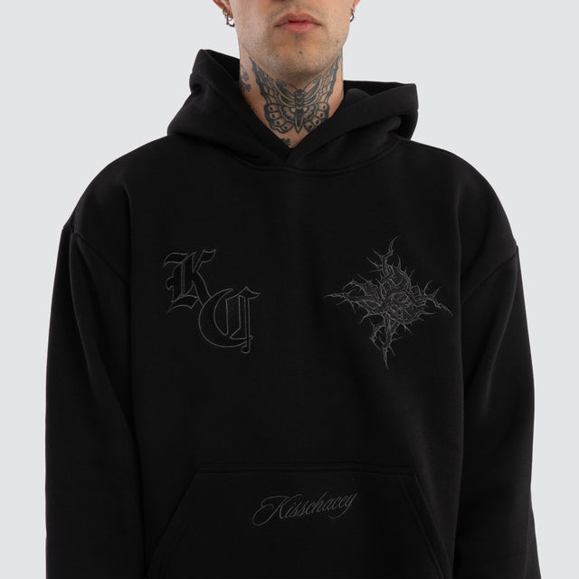 Model wears Paragons Relaxed Hoodie Jet Black Hoodies Black – image 5