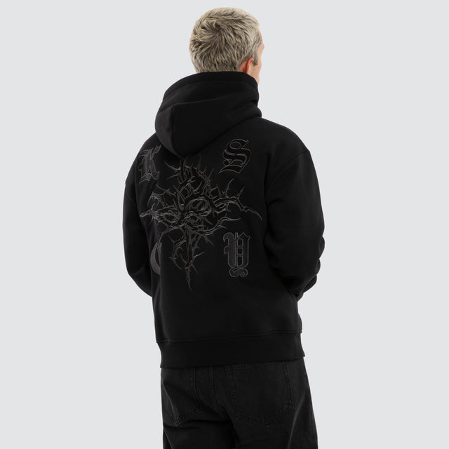 Model wears Paragons Relaxed Hoodie Jet Black Hoodies Black – image 1
