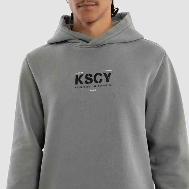 Model wears Reverence Dual Curved Hoodie Pigment Neutral Grey Hoodies Grey – image 4