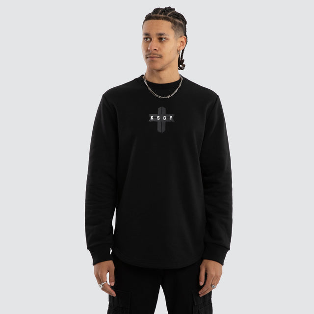 Model wears Salvation Dual Curved Sweater Jet Black Jumpers Black – image 3
