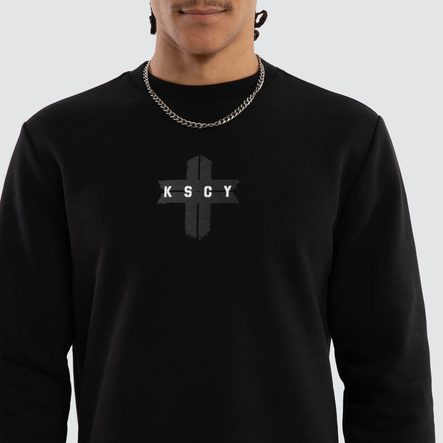 Model wears Salvation Dual Curved Sweater Jet Black Jumpers Black – image 4