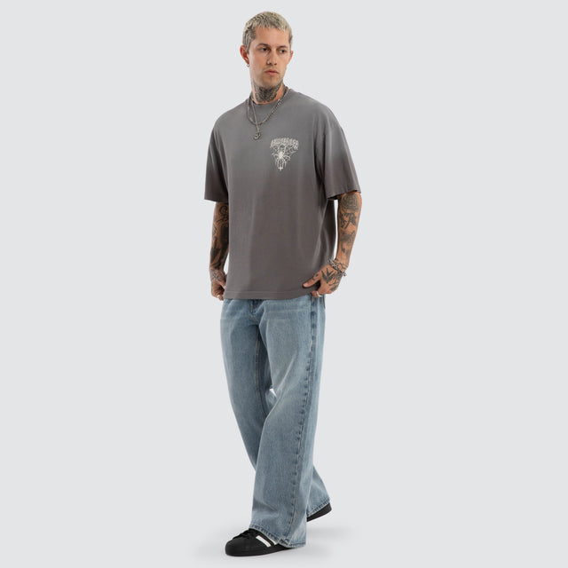 Model wears Knuckle Street Tee Sunbleach Charcoal T-Shirts Grey – image 2