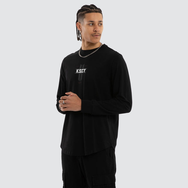 Model wears Mortal Cape Back Long Sleeve Tee Jet Black Longsleeve T-Shirts Black – image 3