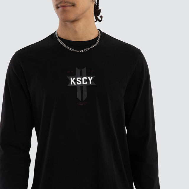 Model wears Mortal Cape Back Long Sleeve Tee Jet Black Longsleeve T-Shirts Black – image 4
