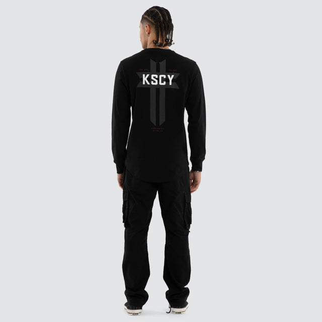 Model wears Mortal Cape Back Long Sleeve Tee Jet Black Longsleeve T-Shirts Black – image 5