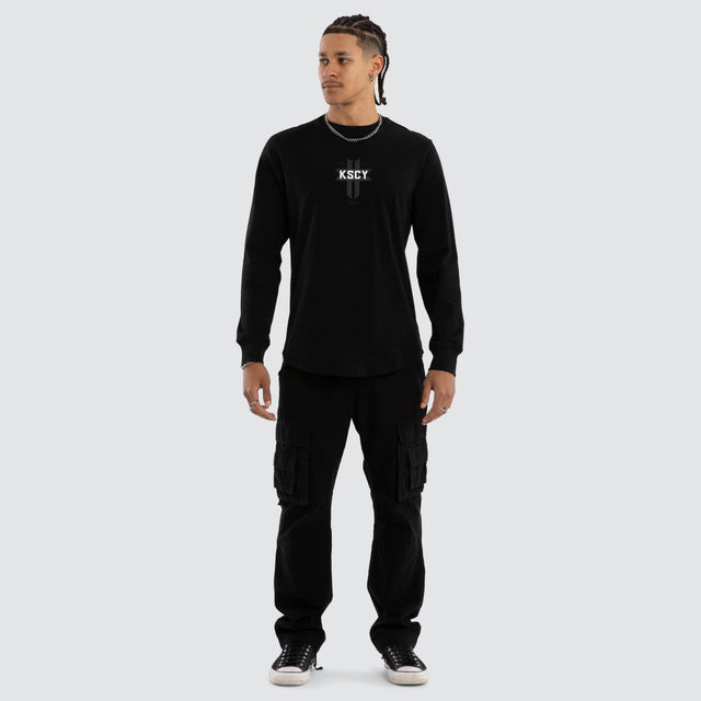 Model wears Mortal Cape Back Long Sleeve Tee Jet Black Longsleeve T-Shirts Black – image 2