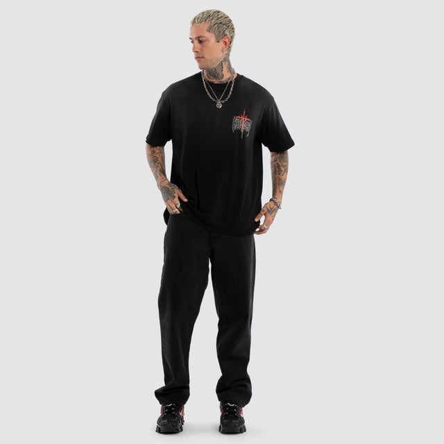 Model wears Embers Box Fit Tee Sunbleach Black T-Shirts Black – image 2
