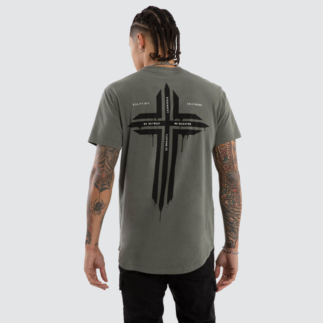 Model wears Preservation Dual Curved Tee Pigment Mulled Basil T-Shirts Green – image 1