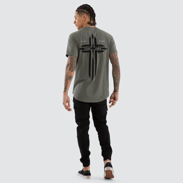 Model wears Preservation Dual Curved Tee Pigment Mulled Basil T-Shirts Green – image 5