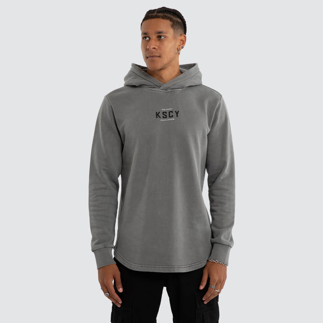 Model wears Void Dual Curved Hoodie Pigment Steel Grey Hoodies Grey – image 3
