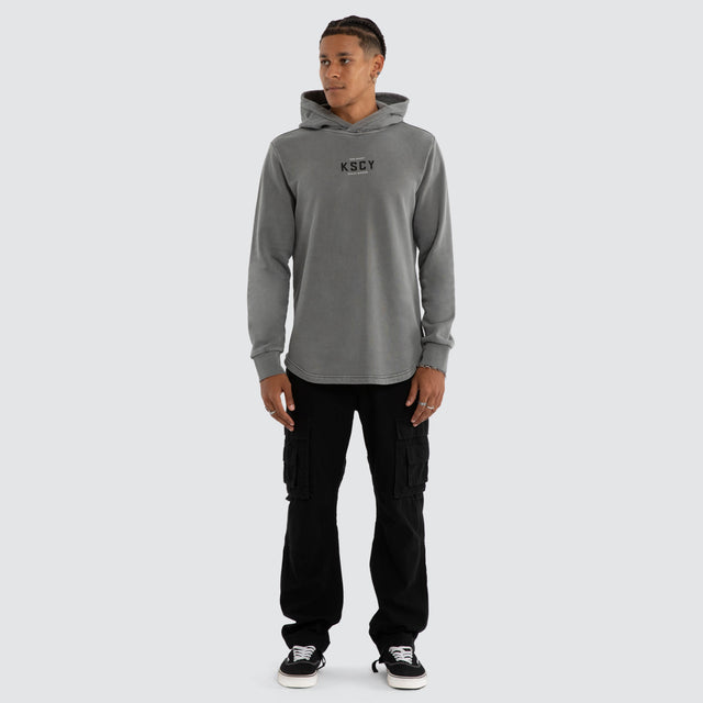 Model wears Void Dual Curved Hoodie Pigment Steel Grey Hoodies Grey – image 2