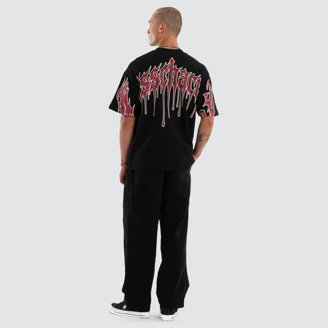 Model wears Glacial Loopback Street Tee Jet Black T-Shirts Black – image 5