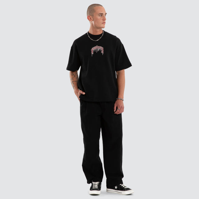 Model wears Glacial Loopback Street Tee Jet Black T-Shirts Black – image 2