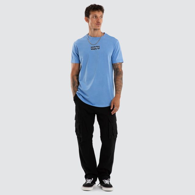 Model wears Severance Dual Curved Tee Pigment Corn Flower T-Shirts Blue – image 4