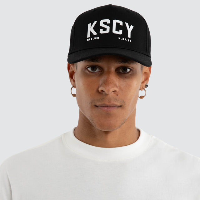 Model wears Cube Cap Jet Black Caps Black – image 2