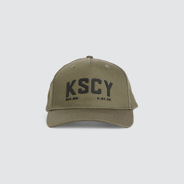 Model wears Cube Cap Khaki Caps Green – image 2